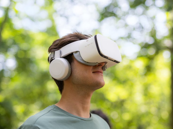 Man looking in VR headset